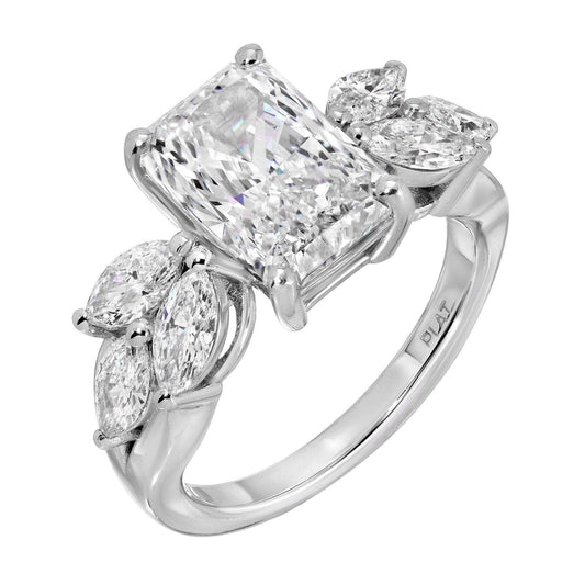 Timeless Brilliance platinum ring with large central diamond and marquise accent stones